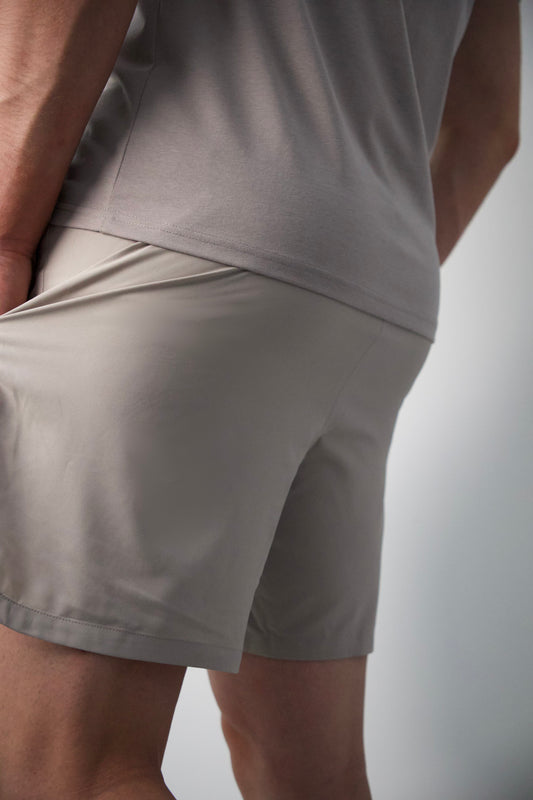 PANTALÓN CORTO DE ENTRENAMIENTO GRIS - ESSENTIALS