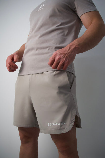 PANTALÓN CORTO DE ENTRENAMIENTO GRIS - ESSENTIALS