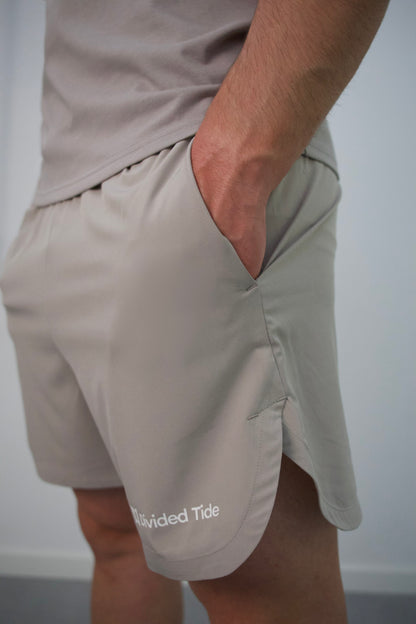 PANTALÓN CORTO DE ENTRENAMIENTO GRIS - ESSENTIALS